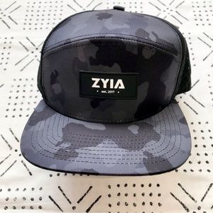ZYIA BLACK CAMO TRUCKER HAT